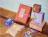 Full colour mailer boxes in several sizes and colours with printed graphics, with packaging fillers