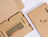 Top-down view of custom laptop cardboard boxes showing a printed keyboard design inside the open lid