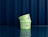 Two stacked green paper ice cream cups printed with ice cream illustrations and 'Miętowa Budka' logo against a blue background