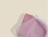 Frosted zipper bag holding a pink knit beanie on a beige background