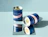 Navy and pink printed paper cans with metal ends, one lying on a mirror