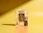 A yellow checkered dog treat box labeled 'GROOVY TREATS' with a clear window showing bone-shaped biscuits next to a photo of a dog