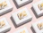 Seamless pattern layout of white cardboard boxes featuring a gold foil 'Linoã' logo on a light pink background