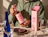 A person in a hoodie holding a bottle of pink tequila cream next to an open matching pink box branded 'DIEX'