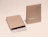 Two expandable kraft mailers with a white print, one open to show the adhesive seal strip