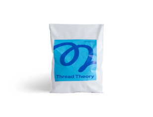 White recycled poly mailer with blue print and logo