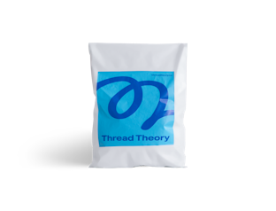 White recycled poly mailer with blue print and logo