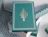 Dark green gift box with gold foil lettering reading 'WINTER WONDERLAND' framed by a geometric border
