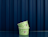 Light green ice cream cups with a white pattern and logo
