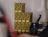A vertical stack of black and yellow patterned coffee boxes labeled 'Rush Mush Coffee Roasters'