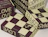 Eco colour mailer boxes with a burgundy and cream checkerboard and lettering print